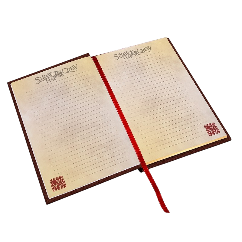 Cahier A5 Premium Skull One Piece ouvert avec pages lignées, logo Straw Hat Crew et marque-page rouge NIPPON DOKI STORE