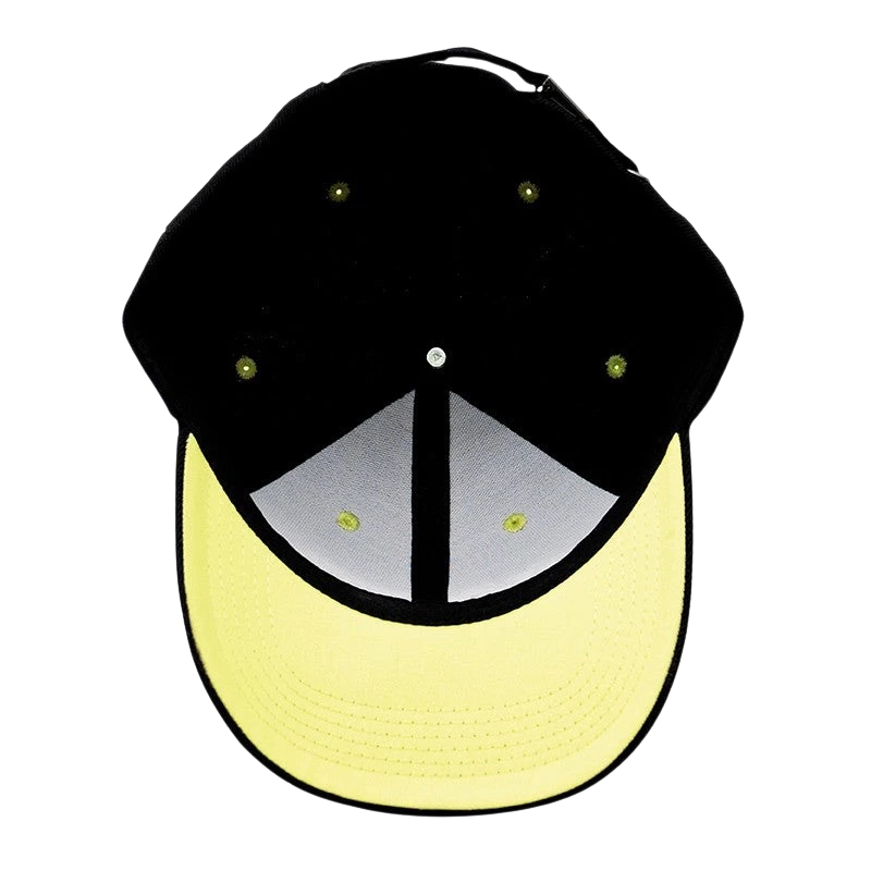 NIPPON DOKI STORE Jujutsu Kaisen black baseball cap with a contrasting yellow brim, top-down view.