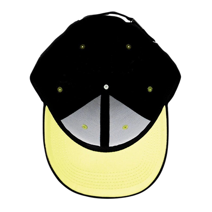 NIPPON DOKI STORE Jujutsu Kaisen black baseball cap with a contrasting yellow brim, top-down view.