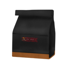 Sac déjeuner noir NIPPON DOKI STORE avec logo One Piece Netflix et base en similicuir marron