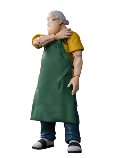 NIPPON DOKI STORE Taro Sakamoto S.H.Figuarts action figure wearing a green apron and yellow shirt in a combat pose