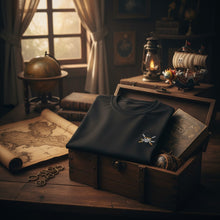 T-shirt noir en coton NIPPON DOKI STORE avec logo One Piece, présenté dans un coffre au trésor style pirate.